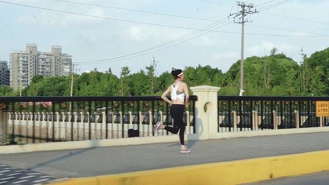 Video Reference: infrastructure, public space, road, recreation, pedestrian, sports, tree, race, physical exercise, city, Person