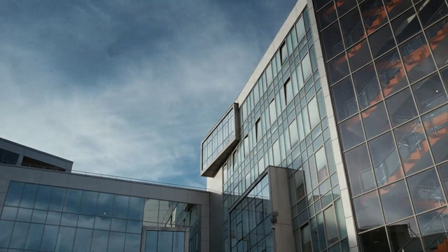 Video Reference: Architecture, Daytime, Sky, Building, Facade, Commercial building, Metropolitan area, Reflection, Line, Glass