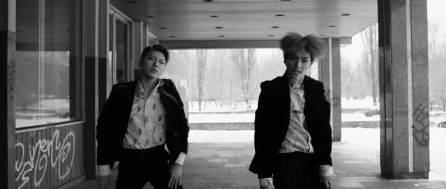 Video Reference: photograph, white, black, black and white, infrastructure, monochrome photography, photography, standing, snapshot, street, Person