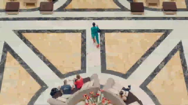 Video Reference: structure, wall, material, art, games, recreation, flooring, play, sport venue, symmetry, Person