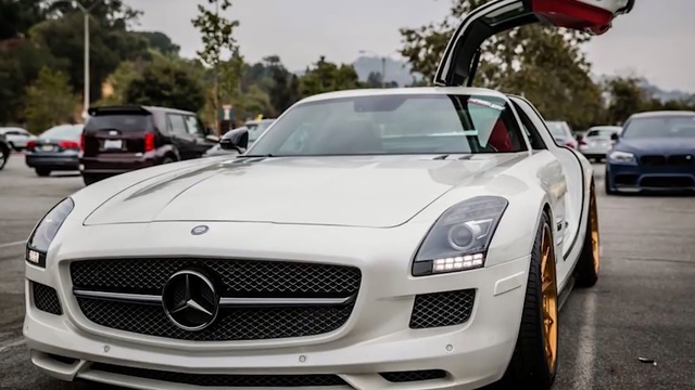 Video Reference: car, land vehicle, motor vehicle, vehicle, mercedes benz sls amg, automotive design, sports car, supercar, luxury vehicle, mercedes benz, Person