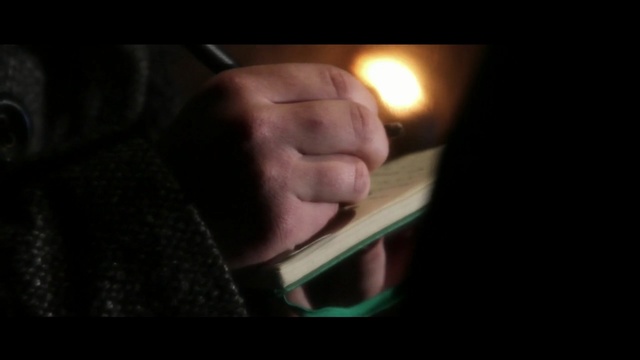 Video Reference: black, face, facial hair, nose, darkness, finger, hand, chin, mouth, lighting