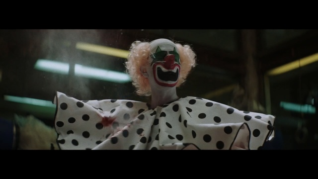 Video Reference: Clown, Performing arts, Mime artist, Smile, Photo caption, Photography, Fictional character, Supervillain, Fiction