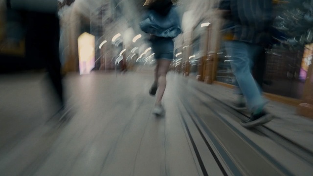 Video Reference: Photograph, Snapshot, Floor, Fun, Flooring, Hardwood, Wood, Photography, Recreation, Pedestrian, Riding, Man, Blurry, Young, Woman, Train, Road, Walking, Board, Street, Standing, Person, Clothing, Footwear, Blur