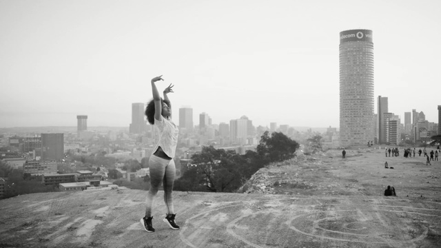 Video Reference: black and white, urban area, monochrome photography, photography, sky, city, tree, monochrome, recreation, building, Person