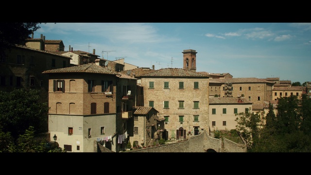 Video Reference: Town, Architecture, Property, Building, Residential area, Human settlement, Landmark, Sky, City, Urban area