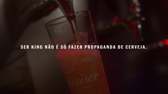 Video Reference: Product, Red, Glass bottle, Drink, Material property, Glass, Label, Drinkware, Fluid, Distilled beverage