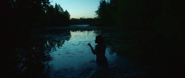 Video Reference: Water, Nature, Blue, Sky, Natural landscape, Reflection, River, Darkness, Evening, Calm, Outdoor, Sport, Dark, Man, Lake, Swimming, Standing, Body, Large, Sunset, Sun, Holding, Boat, Water sport, Day, Distance