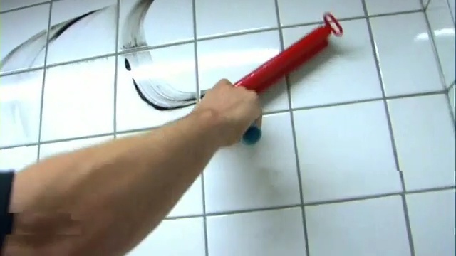 Video Reference: finger, hand, floor, tile, line, flooring, material, product, arm, angle, Person