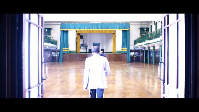 Video Reference: blue, photograph, day, urban area, architecture, light, snapshot, structure, photography, standing, Person