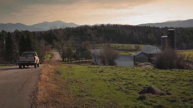Video Reference: highland, road, mountainous landforms, sky, hill, wilderness, rural area, tree, mountain, morning, Person