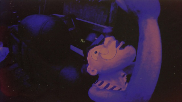 Video Reference: blue, black, purple, darkness, light, art, night, fun, mouth, event, Person