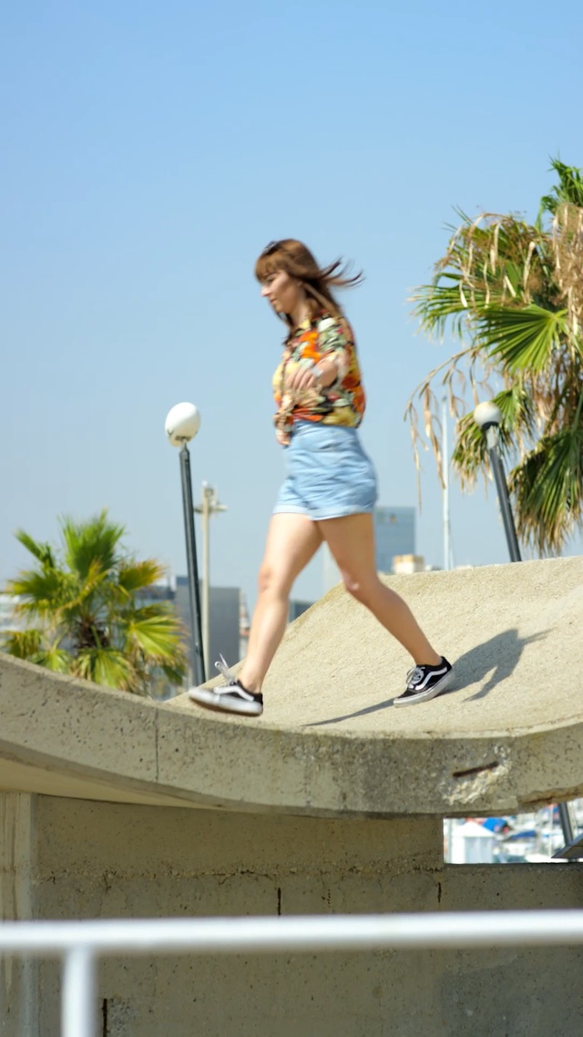 Video Reference: Fun, Vacation, Footwear, Recreation, Leg, Palm tree, Tree, Shorts, Jumping, Leisure, Person