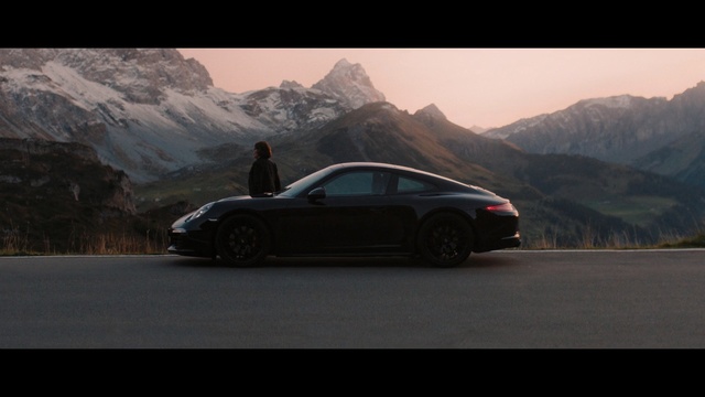 Video Reference: Land vehicle, Vehicle, Car, Automotive design, Luxury vehicle, Performance car, Supercar, Sports car, Porsche, Person
