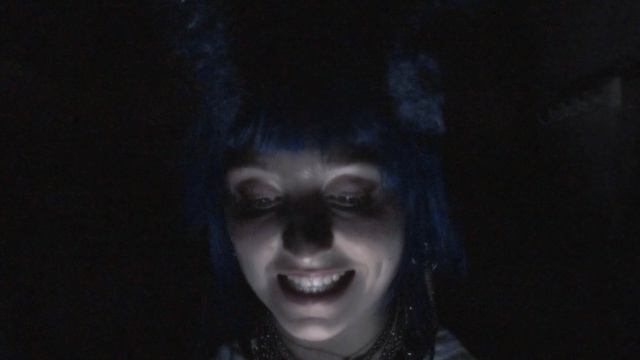 Video Reference: Face, Head, Darkness, Nose, Eyebrow, Fiction, Smile, Black hair, Portrait, Human