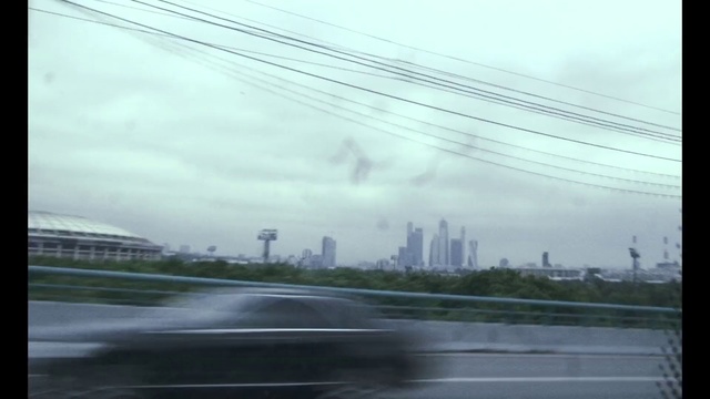 Video Reference: Sky, Atmospheric phenomenon, Daytime, Road, Cloud, Morning, Line, Metropolitan area, Urban area, Infrastructure