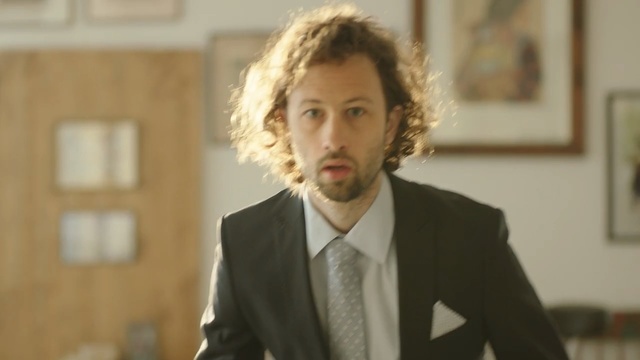 Video Reference: Suit, Gentleman, White-collar worker, Formal wear, Tuxedo, Facial hair, Beard, Photography, Businessperson, Smile, Person