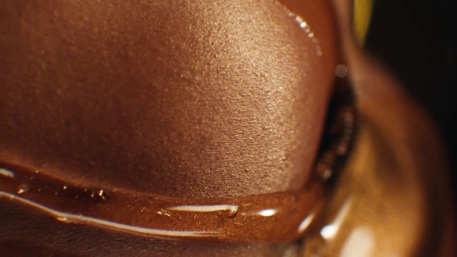 Video Reference: Close-up, Tan, Caramel color, Neck, Nail, Indoor, Sitting, Table, Banana, Black, Close, Chocolate, Brown, Food, Pair, Cake, White, Coffee, Plate, Red, Cat, Drink, Soft drink, Closeup, Beer, Dessert, Mug