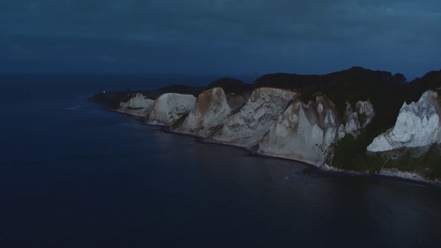 Video Reference: Body of water, Sea, Sky, Coast, Blue, Headland, Ocean, Coastal and oceanic landforms, Cliff, Promontory