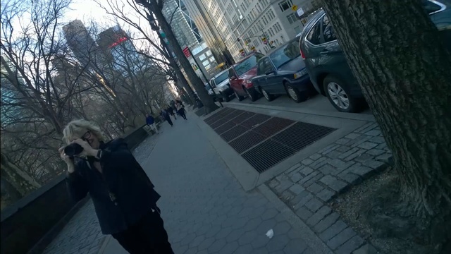 Video Reference: urban area, lane, infrastructure, mode of transport, public space, road, tree, reflection, street, car