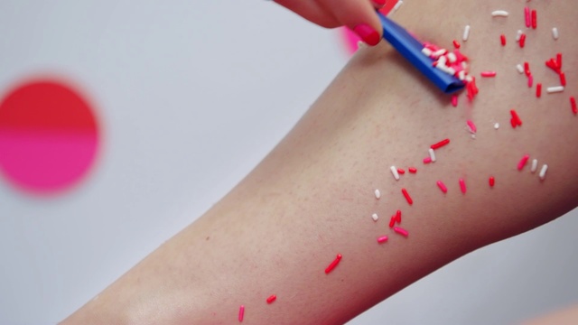 Video Reference: Skin, Nail, Pink, Lip, Temporary tattoo, Finger, Hand, Material property, Lipstick, Cosmetics