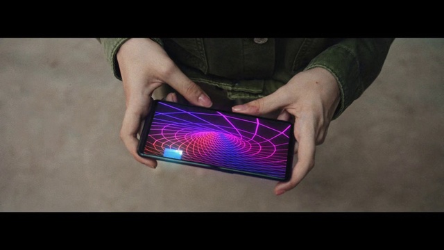Video Reference: Light, Violet, Finger, Technology, Magenta, Electronic instrument, Electronic device, Gadget, Hand, Electronics