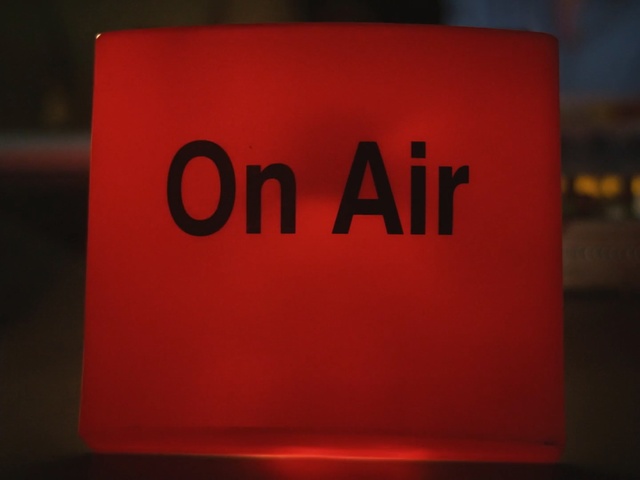 Video Reference: Red, Text, Font, Material property, Signage, Graphics, Person