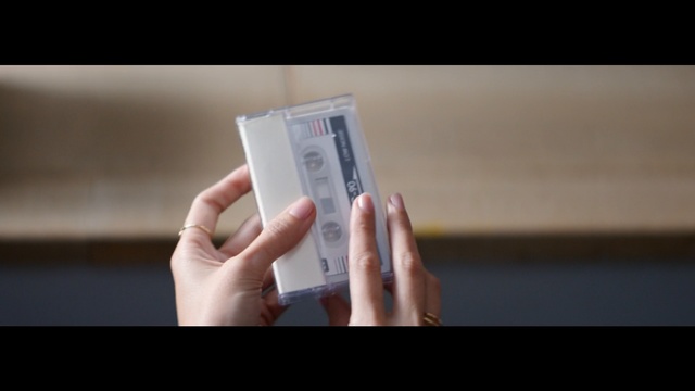 Video Reference: Skin, Text, Hand, Finger, Gadget, Material property, Technology, Electronic device, Nail, Thumb