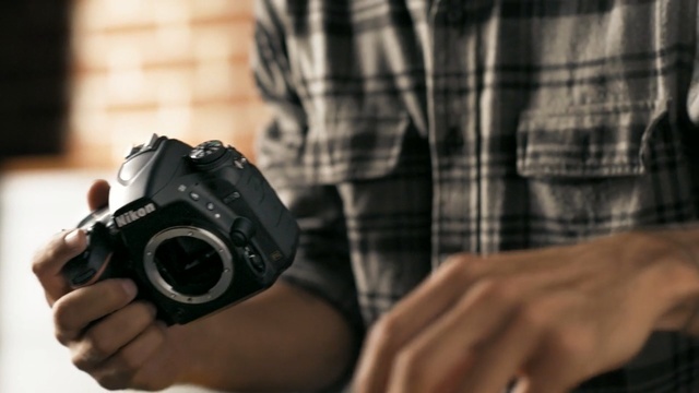 Video Reference: single lens reflex camera, camera, cameras & optics, photographer, digital slr, digital camera, reflex camera, photography, hand, camera lens