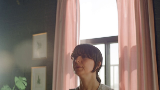 Video Reference: Hair, Face, Head, Curtain, Window covering, Interior design, Skin, Window treatment, Hairstyle, Window