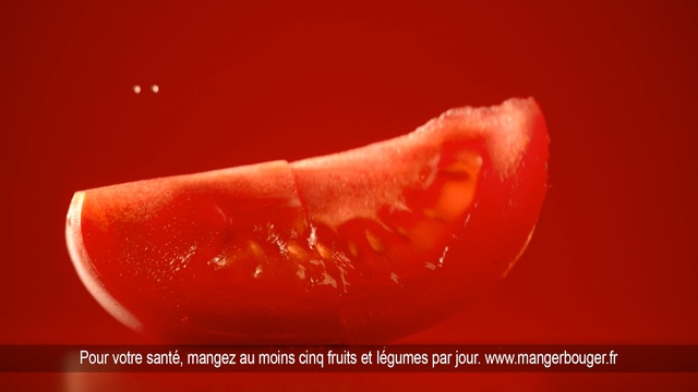 Video Reference: Red, Orange, Mouth, Lip, Tooth, Vegetable, Font, Jaw, Food, Plant, Sitting, Table, Fruit, Laying, Text, Fruit drink