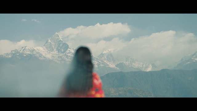 Video Reference: mountainous landforms, sky, mountain, mountain range, cloud, atmosphere, ridge, geological phenomenon, tree, meteorological phenomenon