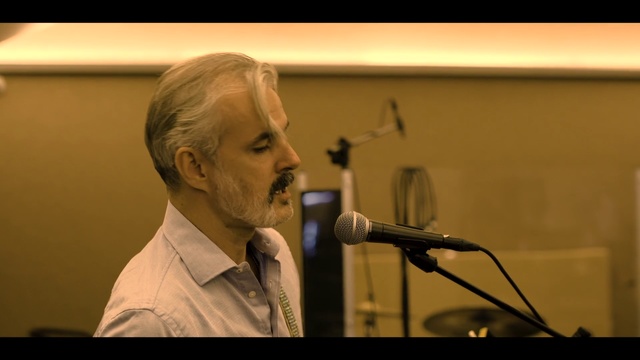 Video Reference: Microphone, Microphone stand, Public speaking, Speech, Audio equipment, Spokesperson, Orator, Singer, Technology, Electronic device