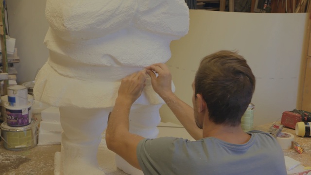 Video Reference: Sculpture, Sculptor, Art, Plaster, Shoulder, Paper, Conservation-restoration, Neck, Paper product, Nonbuilding structure
