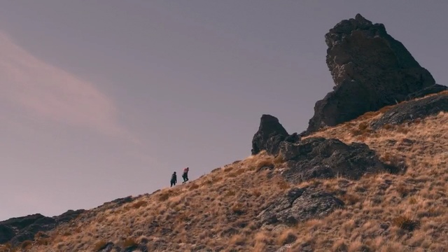 Video Reference: Mountainous landforms, Rock, Sky, Mountain, Atmospheric phenomenon, Ridge, Outcrop, Hill, Landscape, Formation