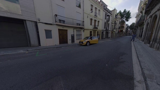 Video Reference: Asphalt, Town, Neighbourhood, Road, Lane, Street, Residential area, Mode of transport, Property, Human settlement, Person