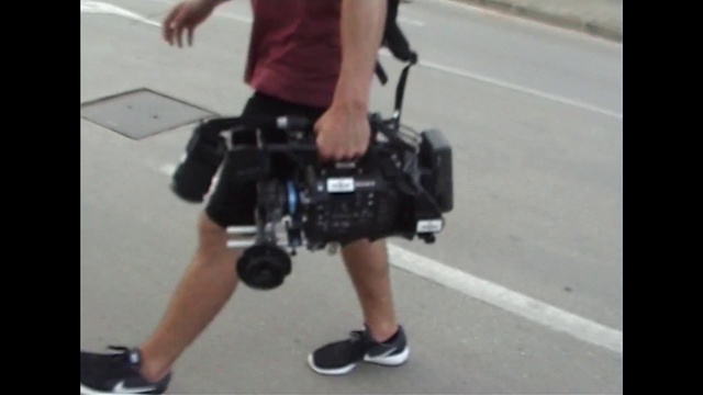 Video Reference: Shoulder, Photography, Joint, Leg, Cameras & optics, Human leg, Camera, Camera operator, Muscle, Single-lens reflex camera