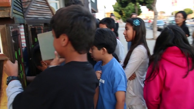 Video Reference: People, Youth, Snapshot, Community, Event, Crowd, Recreation, Street, Black hair, Pedestrian