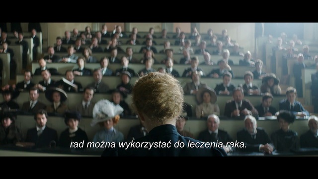 Video Reference: Crowd, Audience, People, Event, Military, Team, Public speaking, Photo caption, Person, Man, Front, Standing, Large, Holding, Auditorium, Player, Ready, Woman, Female, Group, Ball, Computer, Playing, White, Game, Blue, Court, Room, Human face, Clothing