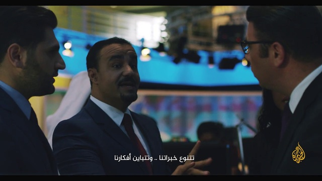 Video Reference: Conversation, Event, Adaptation, White-collar worker, Suit, Businessperson, Photo caption