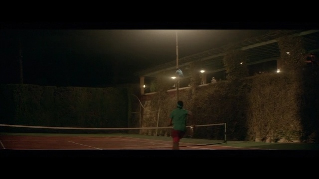 Video Reference: Black, Sport venue, Light, Tennis court, Darkness, Street light, Snapshot, Night, Racquet sport, Real tennis