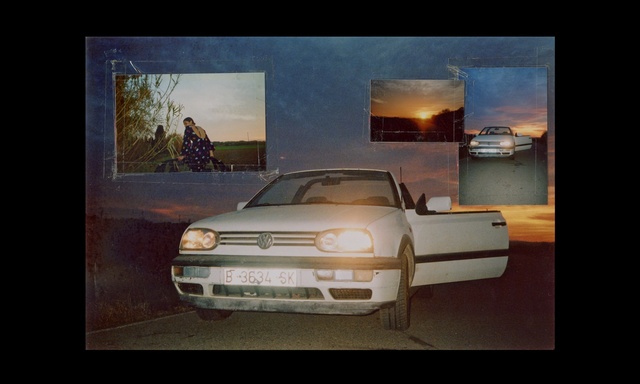 Video Reference: Land vehicle, Vehicle, Car, Automotive design, Vehicle door, Automotive exterior, Auto part, Automotive lighting, Sedan, City car, Indoor, Sitting, Small, Photo, Bed, Room, Front, Table, White, Door, Light, Laying, Desk, Living, Man, Bedroom, Truck, Dog, Night, Text, Wheel