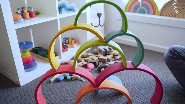 Video Reference: table, play, toy, furniture, chair, toddler, Person