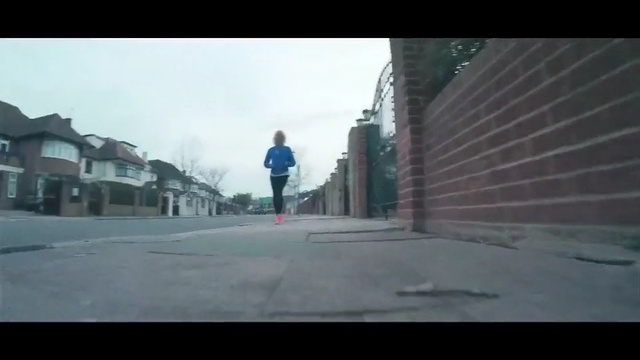 Video Reference: road, lane, urban area, town, street, infrastructure, sky, transport, residential area, mode of transport, Person