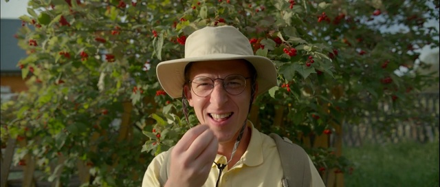 Video Reference: Plant, Headgear, Hat, Tree, Temple, Flower, Fashion accessory, Shrub, Smile, Rose family, Person