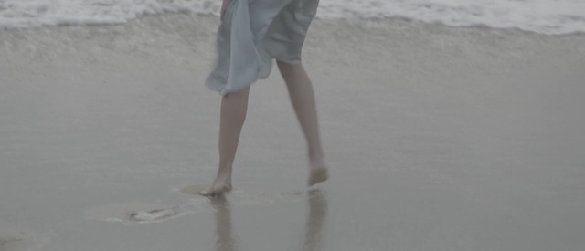 Video Reference: water, leg, foot, freezing, girl, vacation, ice, hand, sand, shoe