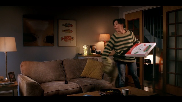 Video Reference: furniture, room, table, sitting, lighting, couch, interior design, darkness, chair