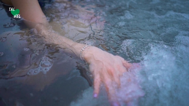 Video Reference: Water, Hand, Leg, Bathing, Foot, Person, Sport, Swimming, Sitting, Young, Small, Cake, Woman, Using, Holding, Girl, Table, Board, Surfing, Wave, Man, White, Cutting, Pink, Bear, Fire, Riding, Laying, Phone, Playing, Ocean, Standing, Hydrant, Game, Water sport