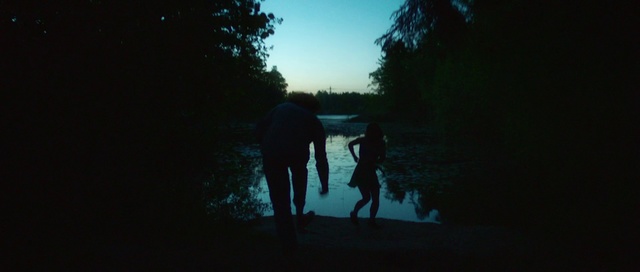 Video Reference: Sky, Water, Darkness, Night, Photography, Tree, Evening, River, Midnight, Dusk, Outdoor, Man, Dark, Standing, Sunset, Walking, Sun, Cross, Looking, Holding, Front, Hill, Dog, Flying, Covered, Kite, Woman, Snow, Country, Street, Red, Field, Skiing, Riding, Slope, Person, Lake, Clothing, Silhouette, Night sky