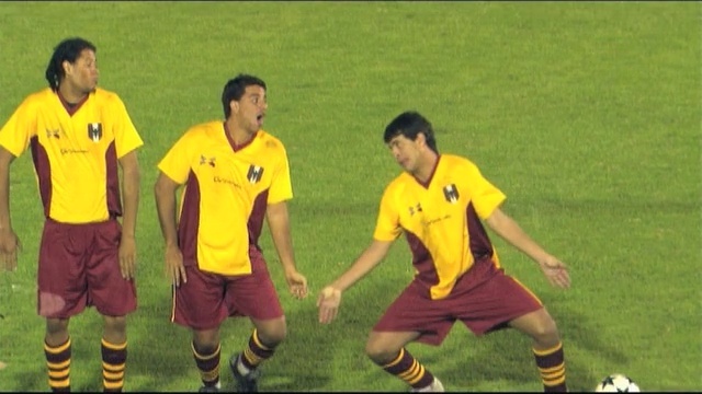 Video Reference: player, football player, yellow, sports, sport venue, football, soccer player, team sport, team, ball